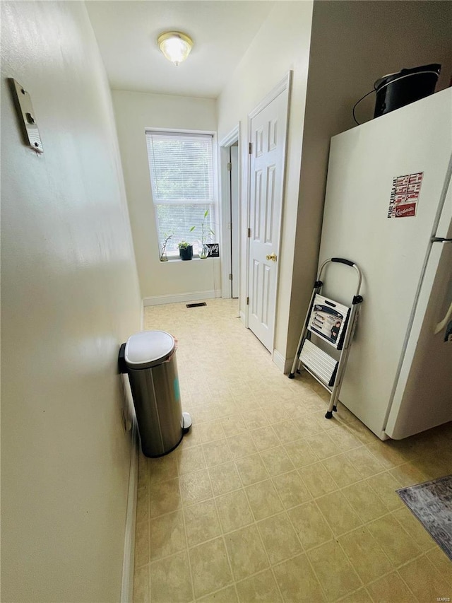 4926 W Florissant Ave, Saint Louis, MO 63115 - hall featuring baseboards