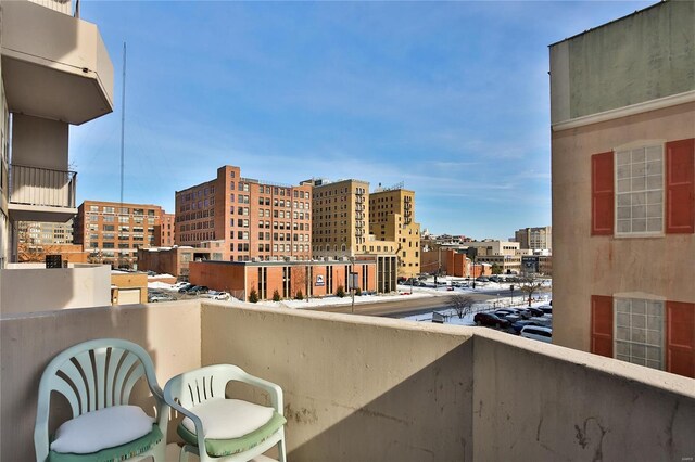 balcony featuring a city view