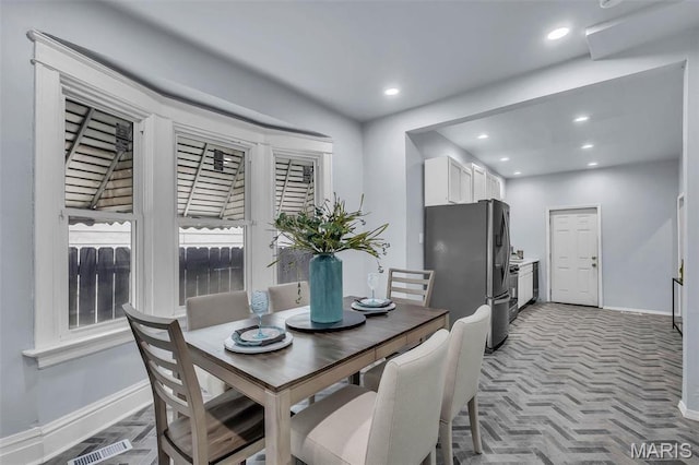 6522 Crest Ave, Saint Louis, MO 63130 - dining space featuring baseboards and recessed lighting