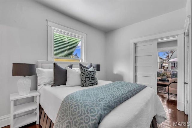 6522 Crest Ave, Saint Louis, MO 63130 - bedroom featuring dark wood finished floors