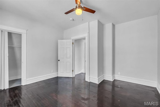 6522 Crest Ave, Saint Louis, MO 63130 - unfurnished bedroom featuring wood finished floors, baseboards, a ceiling fan, and a closet