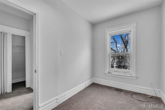 6522 Crest Ave, Saint Louis, MO 63130 - spare room with carpet and baseboards