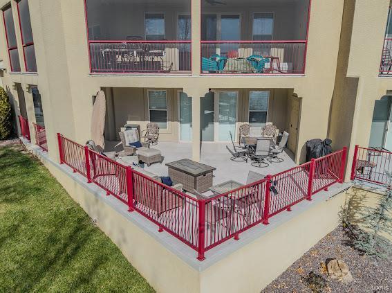 view of patio featuring a balcony