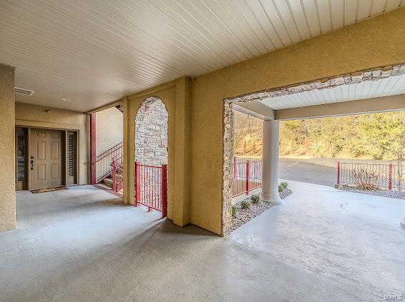 view of patio / terrace featuring fence