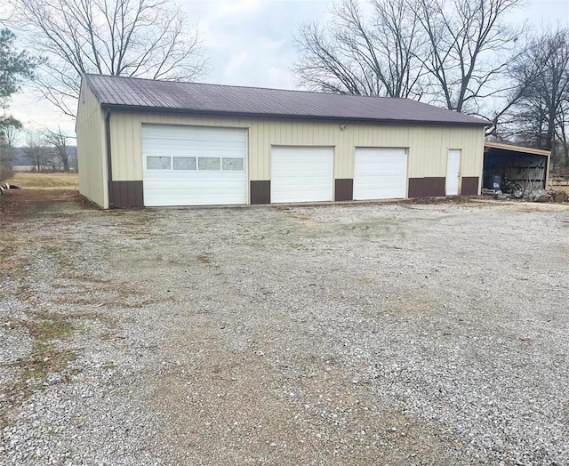 9667 State Highway 25 S, Dexter, MO 63841 - garage with a detached garage and driveway