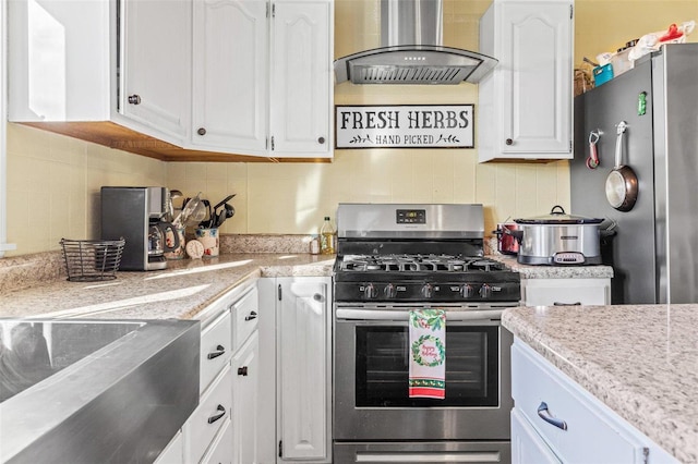 10751 State Route F, Farmington, MO 63640 - kitchen with stainless steel appliances, wall chimney exhaust hood, white cabinets, and decorative backsplash