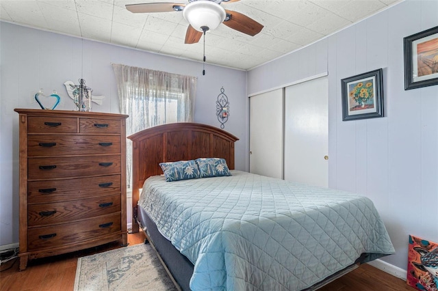 10751 State Route F, Farmington, MO 63640 - bedroom featuring wood finished floors, a closet, and a ceiling fan