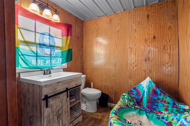 10751 State Route F, Farmington, MO 63640 - half bath featuring toilet, wooden walls, and a sink