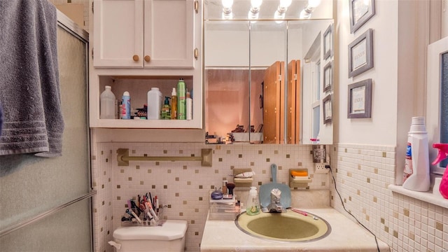 989 Clay St, Saint Clair, MO 63077 - bathroom with toilet, tasteful backsplash, vanity, and an enclosed shower