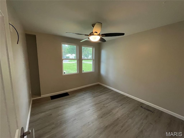 3305 Fee Fee Rd, Bridgeton, MO 63044 - spare room featuring ceiling fan, wood finished floors, and baseboards