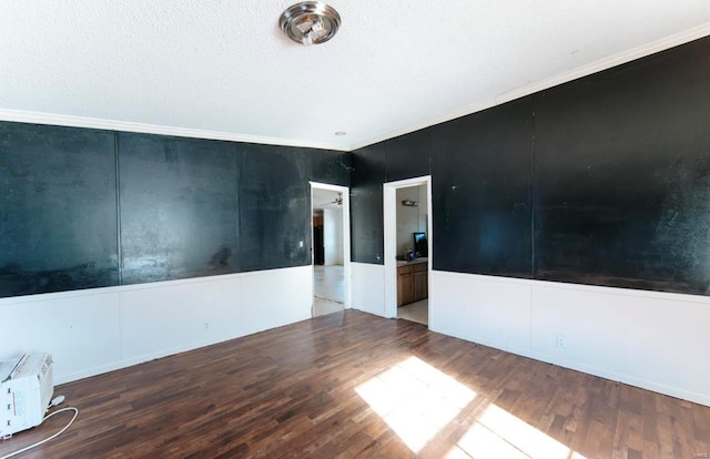30190 S US Highway 63, Edgar Springs, MO 65462 - unfurnished room featuring wood finished floors, a textured ceiling, and ornamental molding