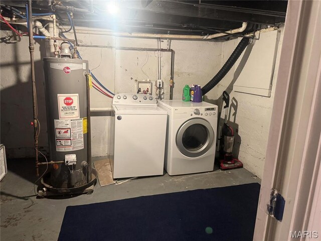 3511 Oakdale Ave, Saint Louis, MO 63121 - laundry room with gas water heater and washer and clothes dryer