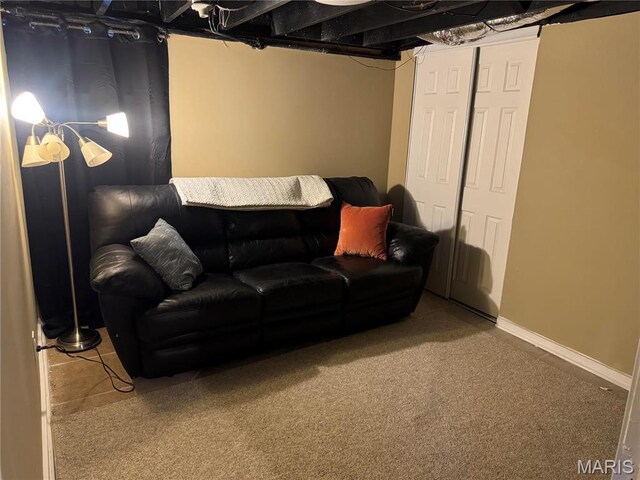 3511 Oakdale Ave, Saint Louis, MO 63121 - carpeted living room featuring baseboards