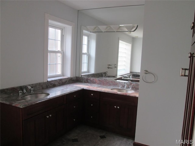 7939 Delmar Blvd Unit 1W, Saint Louis, MO 63130 - bathroom featuring a sink