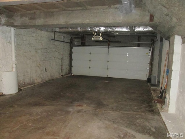 7939 Delmar Blvd Unit 1W, Saint Louis, MO 63130 - garage featuring a garage door opener