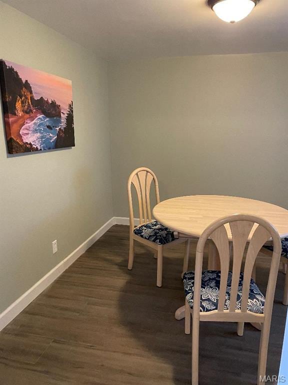 6746 Vernon Ave, University City, MO 63130 - dining space with wood finished floors and baseboards