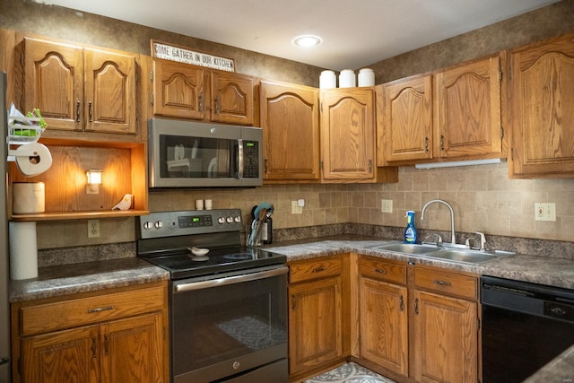 12332 Triple E Ln, Berger, MO 63014 - kitchen with stainless steel appliances, a sink, brown cabinetry, and backsplash