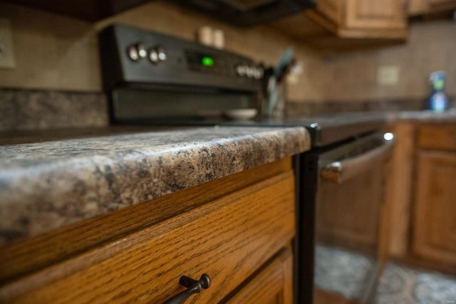 12332 Triple E Ln, Berger, MO 63014 - kitchen view of brown cabinets and stainless steel electric range