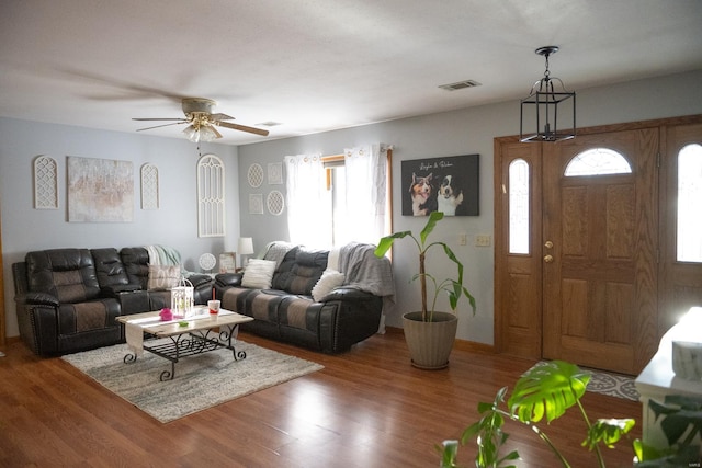 12332 Triple E Ln, Berger, MO 63014 - living room with plenty of natural light, wood finished floors, ceiling fan, and baseboards