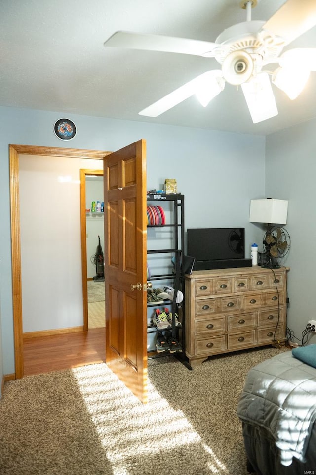 12332 Triple E Ln, Berger, MO 63014 - bedroom featuring ceiling fan, a skylight, and wood finished floors