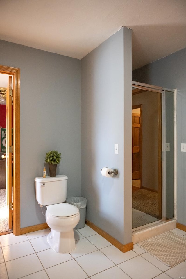 12332 Triple E Ln, Berger, MO 63014 - bathroom featuring a stall shower, baseboards, toilet, and tile patterned flooring