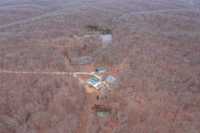 26380 Pebble Creek Dr, Warrenton, MO 63383 - view of property location with a heavily wooded area