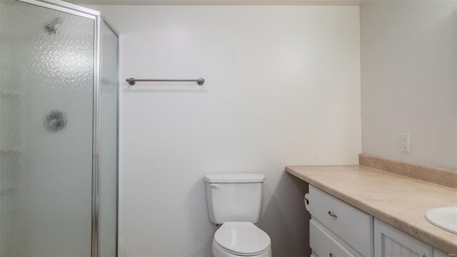 26380 Pebble Creek Dr, Warrenton, MO 63383 - bathroom featuring vanity, a shower stall, and toilet