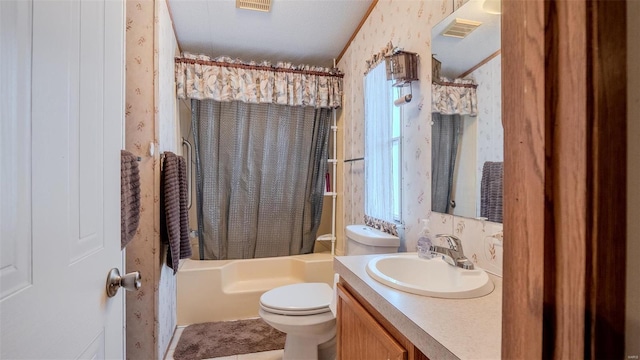 26380 Pebble Creek Dr, Warrenton, MO 63383 - bathroom with wallpapered walls, toilet, vanity, tile patterned floors, and shower / tub combo