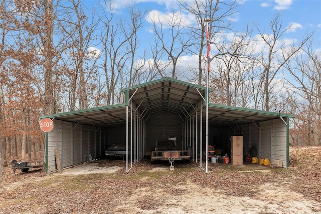 26380 Pebble Creek Dr, Warrenton, MO 63383 - view of parking with a detached carport