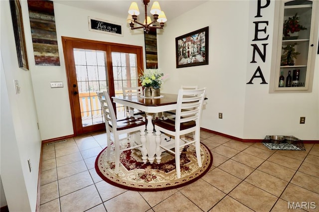 18921 Pleasant View Ln, Lebanon, MO 65536 - dining room with a chandelier, light tile patterned floors, and baseboards