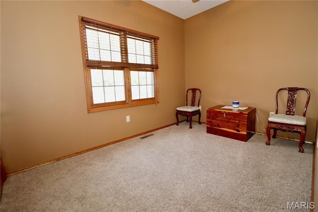 18921 Pleasant View Ln, Lebanon, MO 65536 - sitting room featuring carpet floors, baseboards, and a ceiling fan