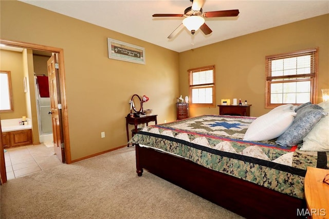 18921 Pleasant View Ln, Lebanon, MO 65536 - bedroom with light carpet, baseboards, ensuite bathroom, ceiling fan, and light tile patterned floors