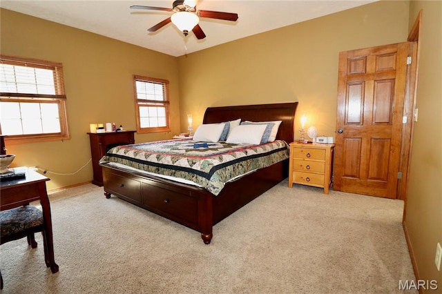18921 Pleasant View Ln, Lebanon, MO 65536 - carpeted bedroom with baseboards and ceiling fan