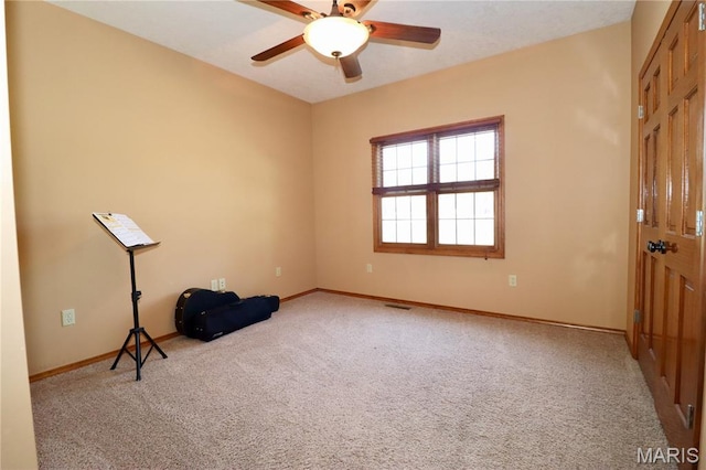 18921 Pleasant View Ln, Lebanon, MO 65536 - unfurnished room with light colored carpet, a ceiling fan, and baseboards