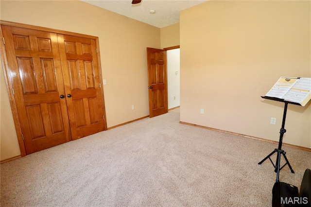18921 Pleasant View Ln, Lebanon, MO 65536 - unfurnished bedroom featuring carpet, baseboards, and a ceiling fan