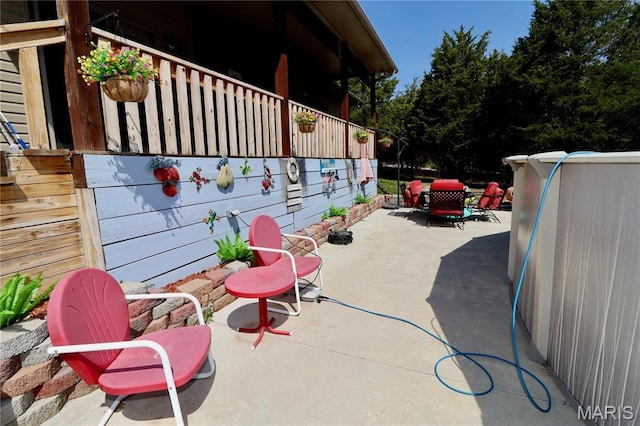 18921 Pleasant View Ln, Lebanon, MO 65536 - view of patio with outdoor dining space