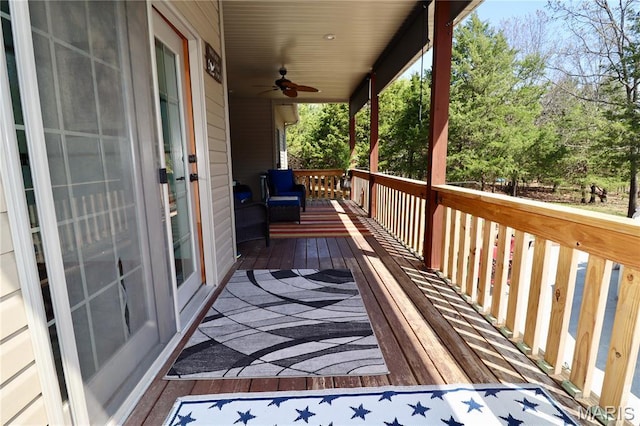 18921 Pleasant View Ln, Lebanon, MO 65536 - wooden terrace with ceiling fan