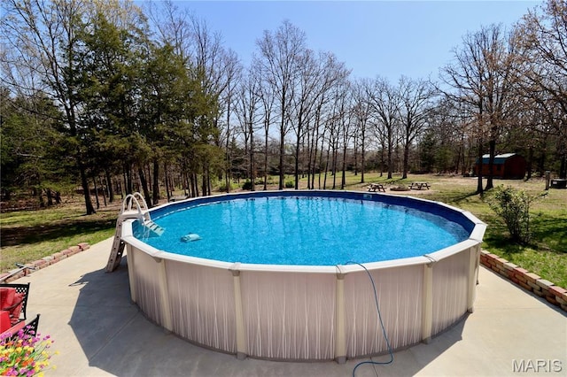 18921 Pleasant View Ln, Lebanon, MO 65536 - swimming pool featuring view of scattered trees
