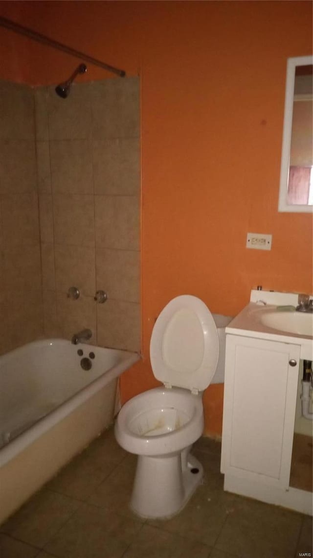 4341 Shreve Ave, Saint Louis, MO 63115 - bathroom featuring tile patterned floors, toilet, shower / bathtub combination, and vanity