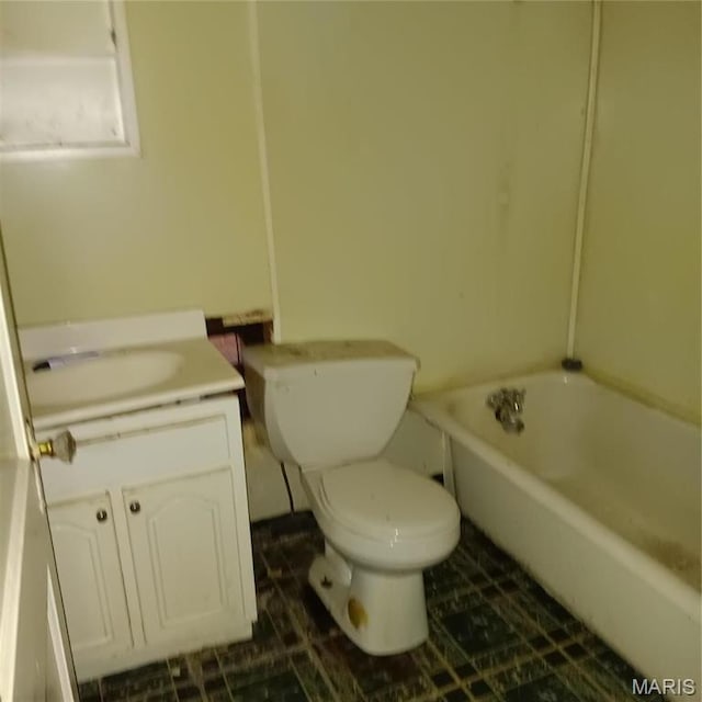 4341 Shreve Ave, Saint Louis, MO 63115 - full bathroom with toilet, a tub, vanity, and tile patterned flooring