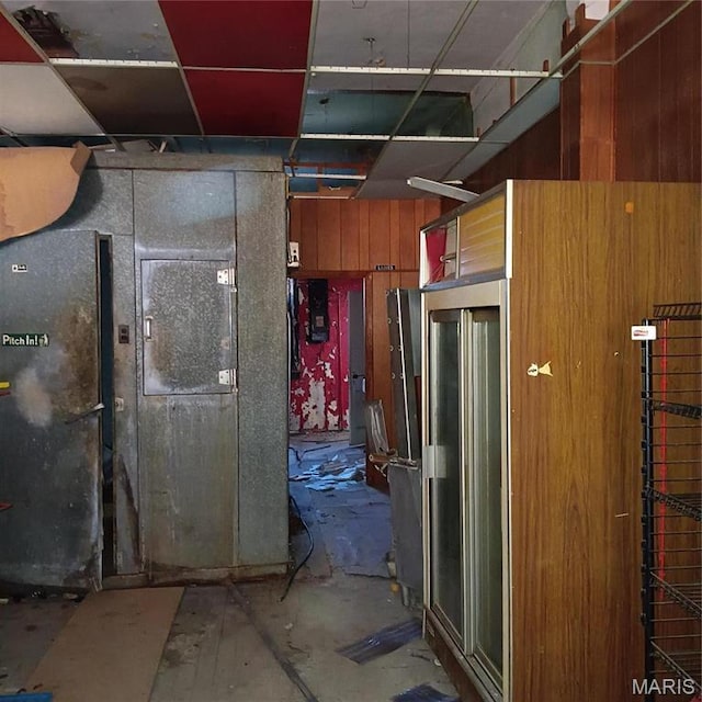 4341 Shreve Ave, Saint Louis, MO 63115 - miscellaneous room featuring wooden walls