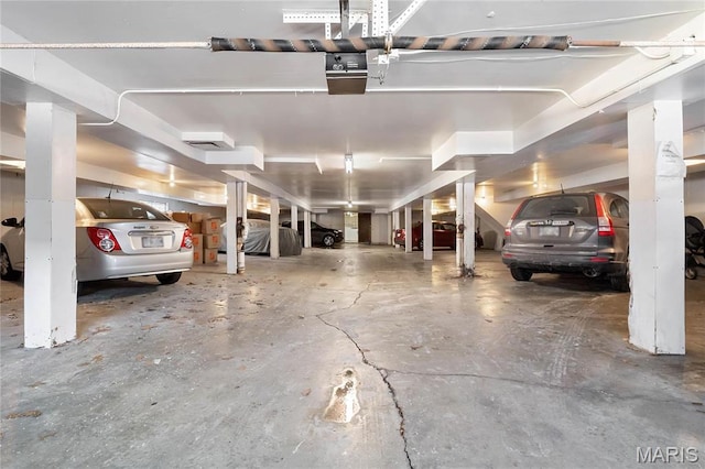13453 Coliseum Dr Unit E, Chesterfield, MO 63017 - parking garage featuring a garage door opener