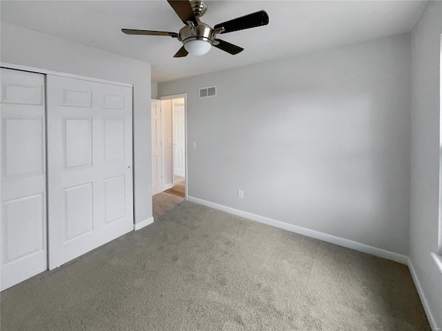 1253 Orion Way, Saint Peters, MO 63376 - unfurnished bedroom featuring carpet, baseboards, a closet, and ceiling fan