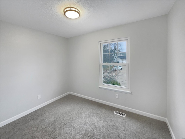 1253 Orion Way, Saint Peters, MO 63376 - carpeted empty room with baseboards and a textured ceiling