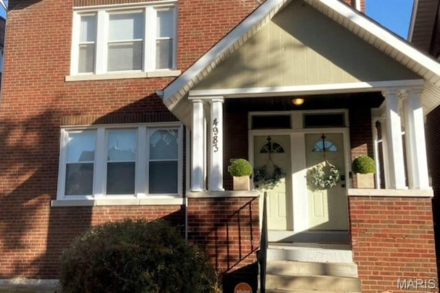 4983 Chippewa St, Saint Louis, MO 63109 - entrance to property featuring brick siding