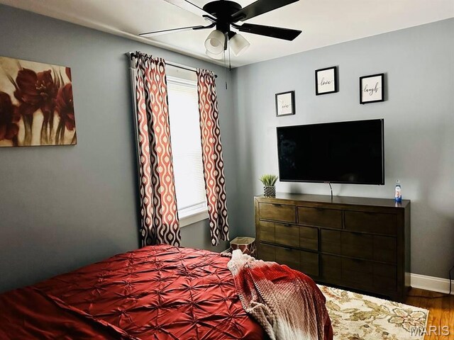 4983 Chippewa St, Saint Louis, MO 63109 - bedroom featuring wood finished floors, baseboards, and a ceiling fan