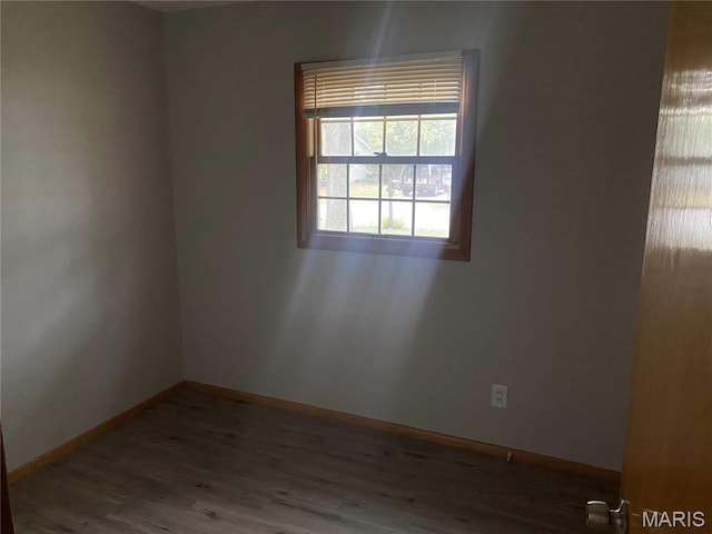 1445 Fairmeadows Ln, Saint Louis, MO 63138 - unfurnished room with wood finished floors and baseboards