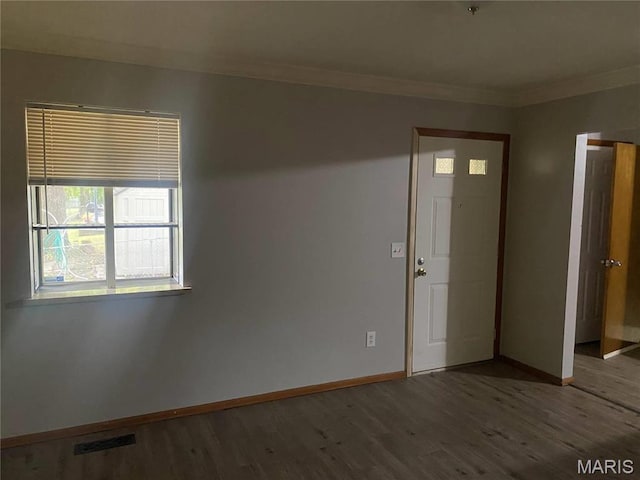1445 Fairmeadows Ln, Saint Louis, MO 63138 - spare room with baseboards, wood finished floors, and crown molding