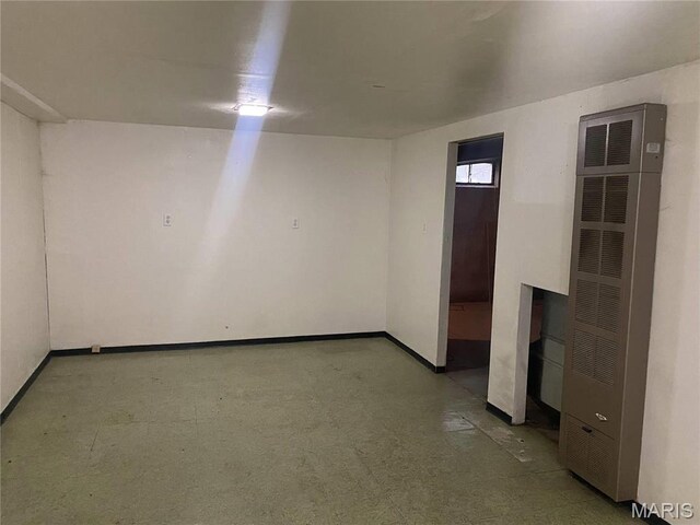 1445 Fairmeadows Ln, Saint Louis, MO 63138 - spare room with a heating unit, baseboards, and light floors