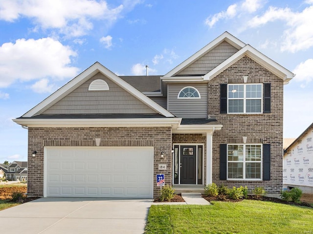 1741 Martingale Ln, Eureka, MO 63025 - view of front of property with concrete driveway, brick siding, and a garage
